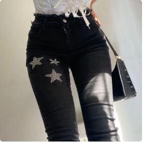 Rhinestone-Embellished Y2K Jeans for a Chic Grunge Aesthetic Look